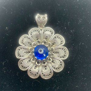 DGS Sterling Silver 925 Flower Pendant W/Blue Eye Center Stone